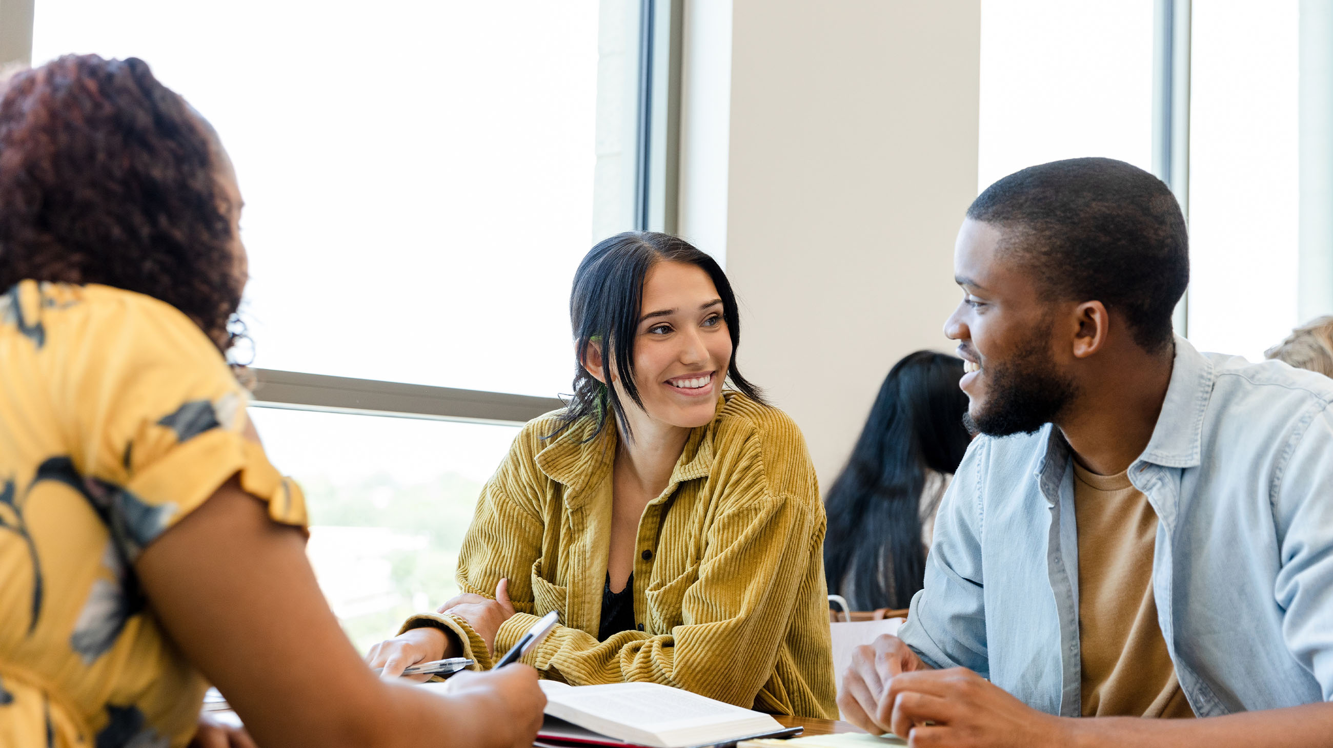 group of multicultural students in discussion