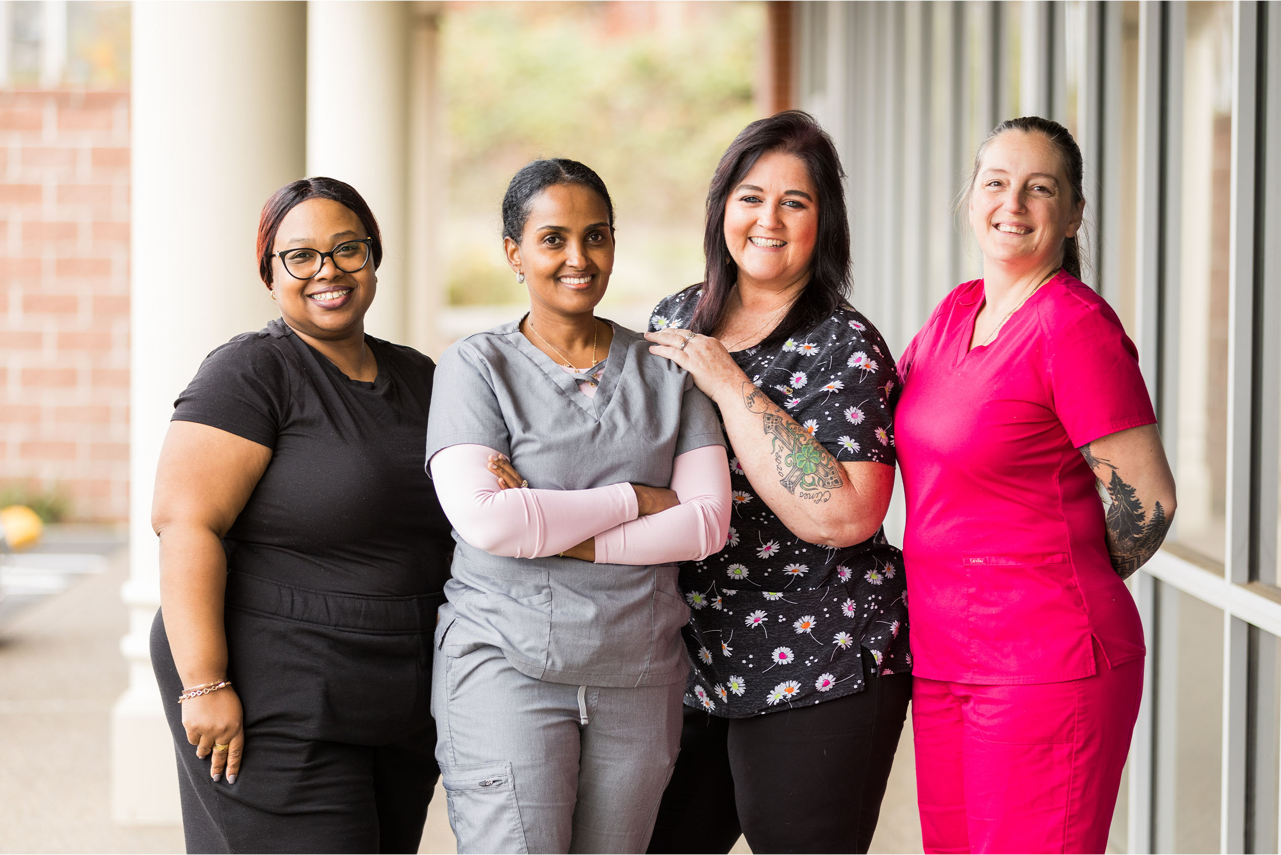 group of professional women looking at camera