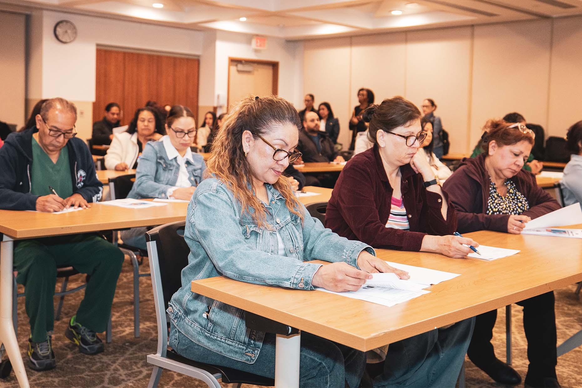 group of professional students studying in hall