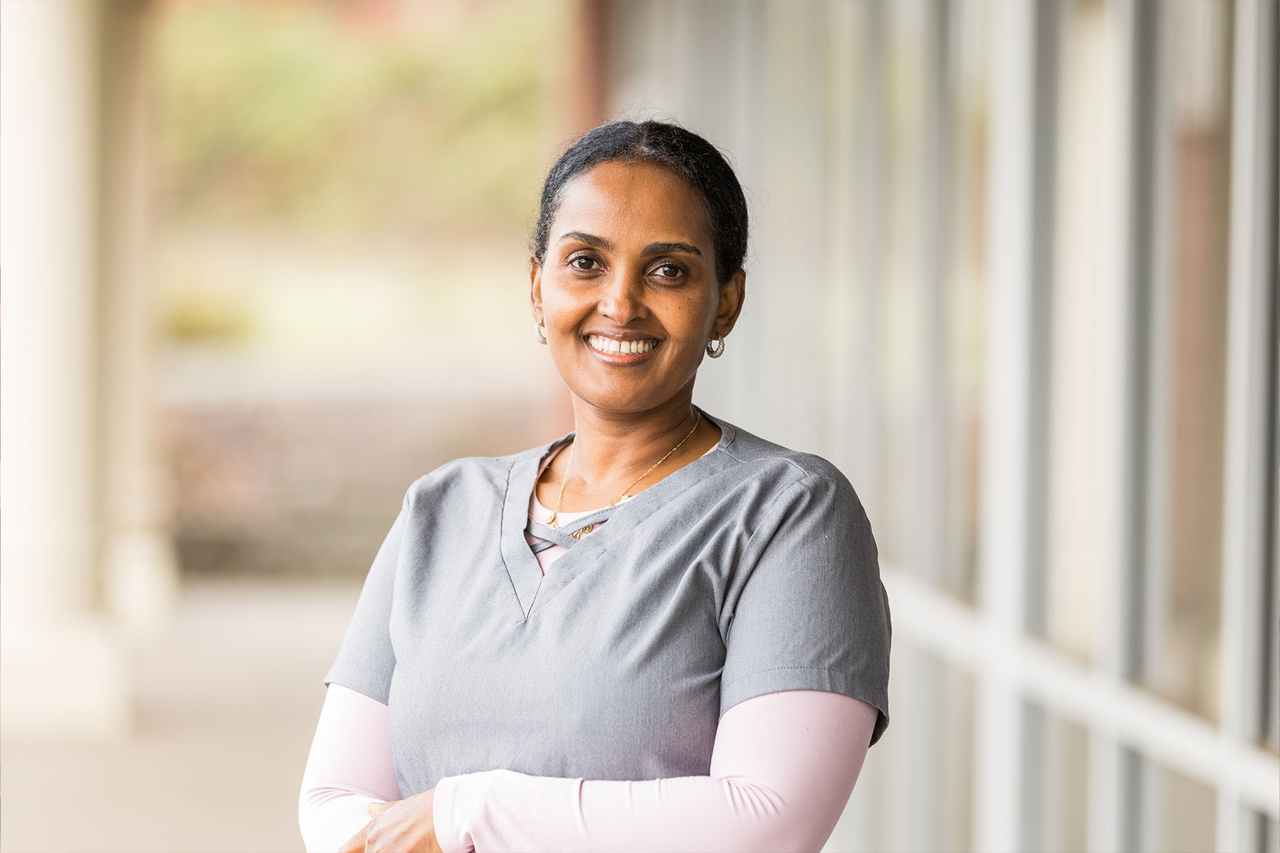 female medical professional smiling at camera