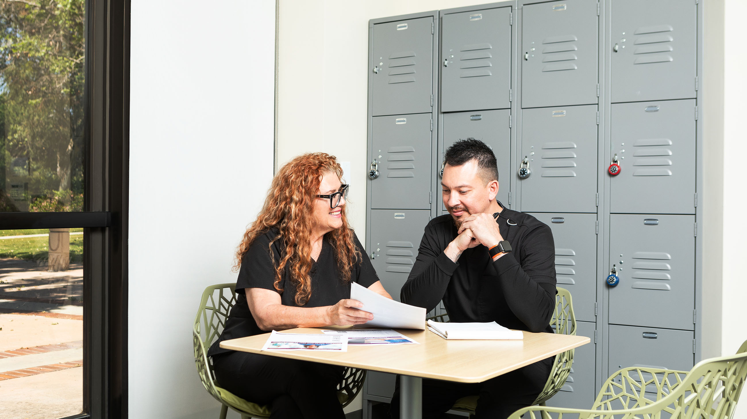 advisor speaking to professional student